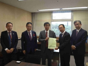 写真：佐々木審議官