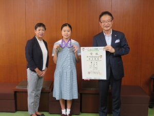 写真：アーティスティックスイミング優勝報告