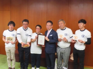 写真:認定報告の様子