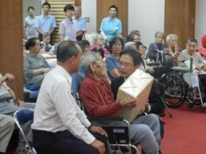 写真：高橋竹三郎さんと