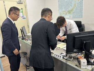 写真：青木崇光企画課評価室企画専門官